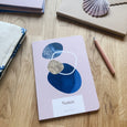Our beautiful Shoreline coastal notebooks feature pebble inspired shapes on the cover, designed in our Cornwall studio. 