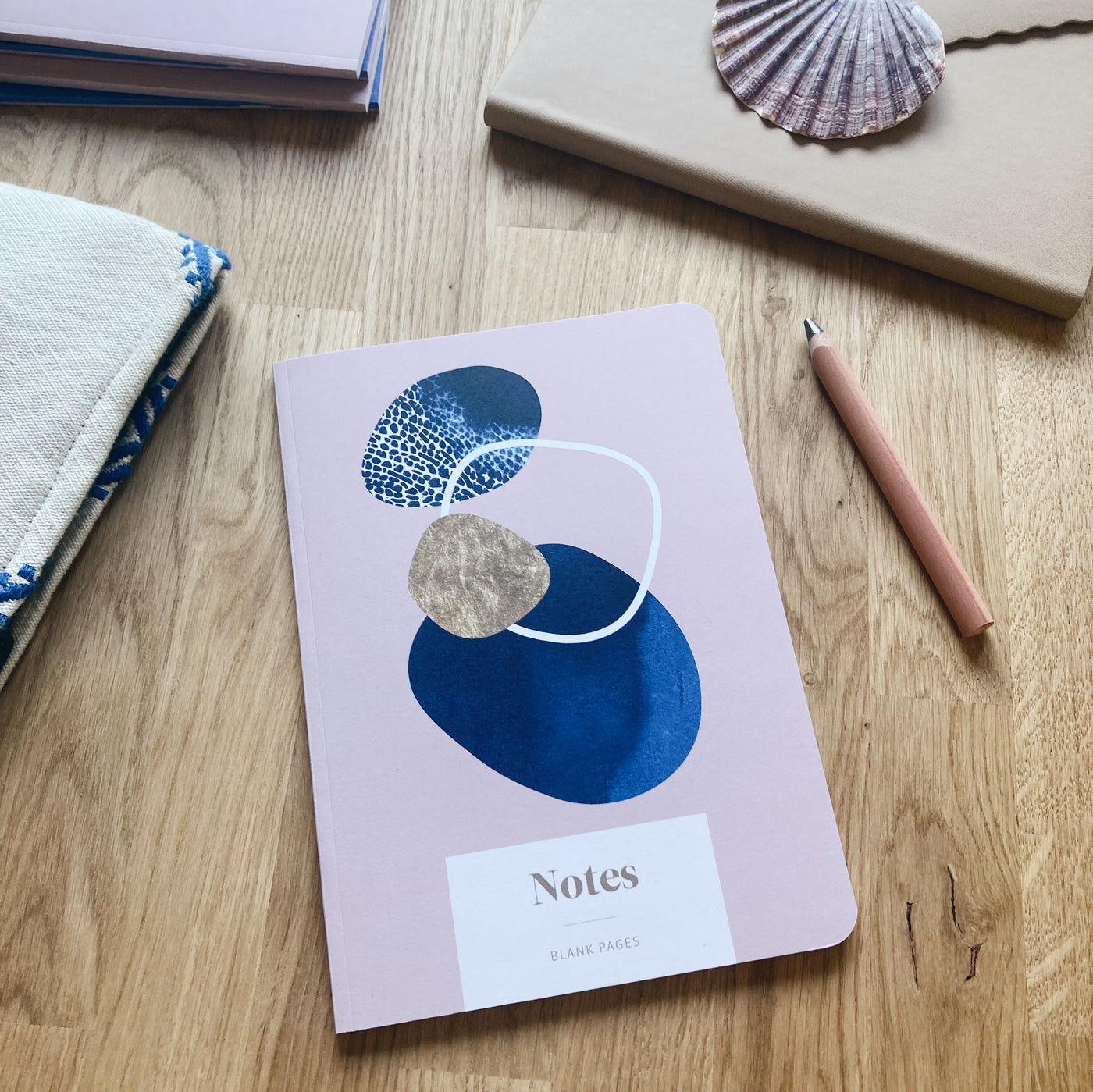 Our beautiful Shoreline coastal notebooks feature pebble inspired shapes on the cover, designed in our Cornwall studio. 