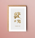 A beautiful set of 5 Thank You note cards, complete with kraft envelopes. Card designs feature blue and gold beach inspired illustrations, including seaweed and pebbles.