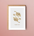 A beautiful set of 5 Thank You note cards, complete with kraft envelopes. Card designs feature blue and gold beach inspired illustrations, including seaweed and pebbles.