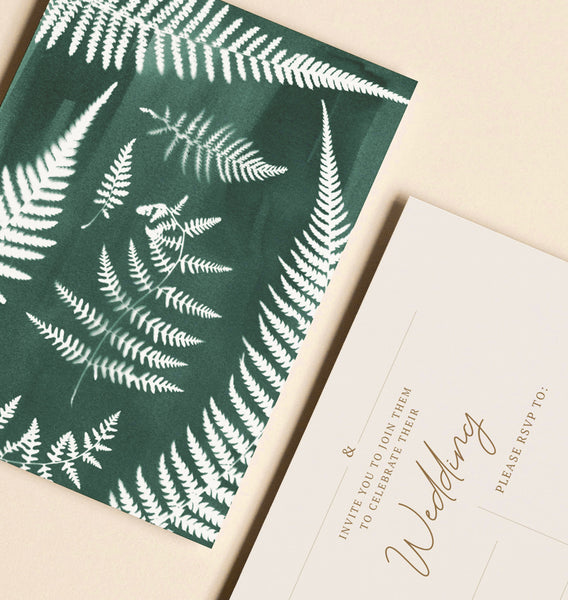 Paper Birch Fern Wedding Invitations featuring pressed ferns exposed in sunlight using the cyanotype technique. A natural soft green in colour, A6 in size and left blank for you to fill in your special day details.
