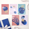 Our Art Print &amp; Postcard Gift Set pairs our best selling Shoreline prints with our matching Shoreline colourful postcards. A perfect art and stationery gift for beach lovers and those who love the sea. 