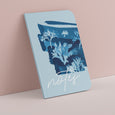 Our Tideline coastal notebook features a cyanotype impression of seaweed on the cover, designed in our Cornwall studio. Notebooks are filled with 60 pages of plain (blank) white paper, perfect for jotting down ideas and sketches.