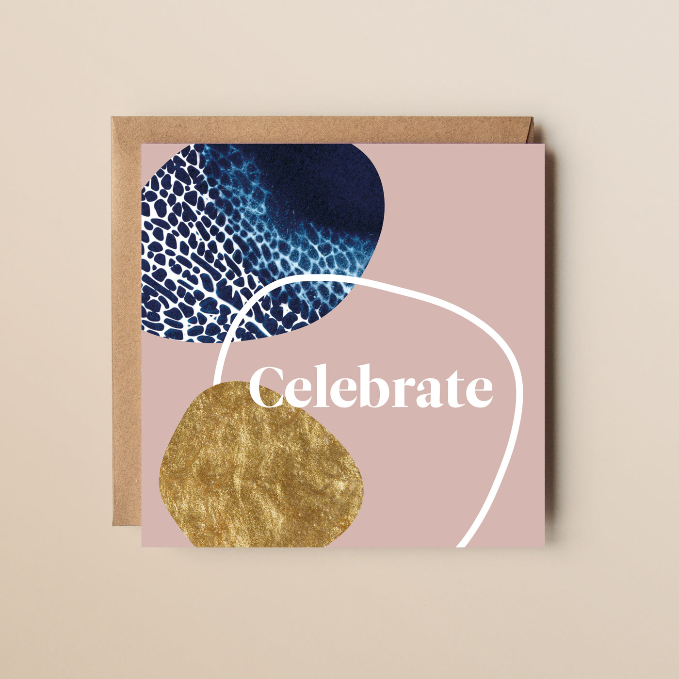 A coastal inspired celebration card, featuring pebble like forms and cyanotype printed textures. 